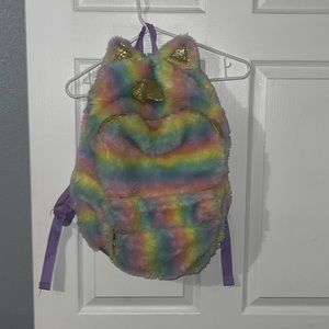 Unicorn furry bag pack from journeys